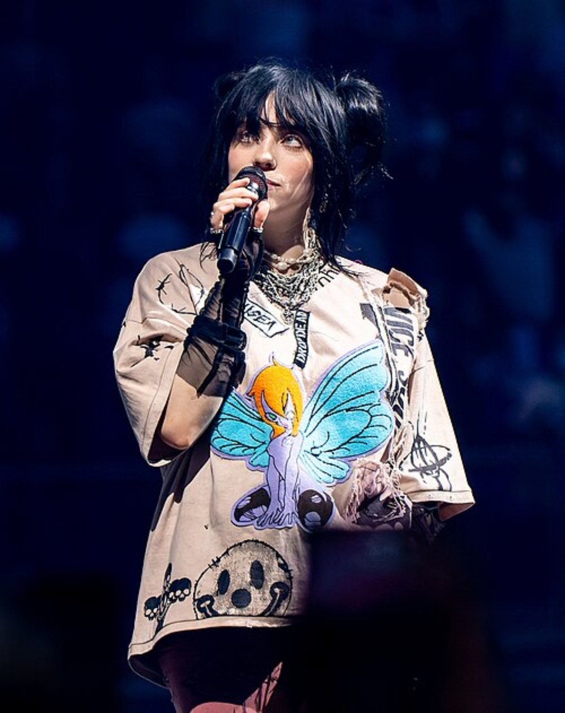 Billie Eilish performing on stage