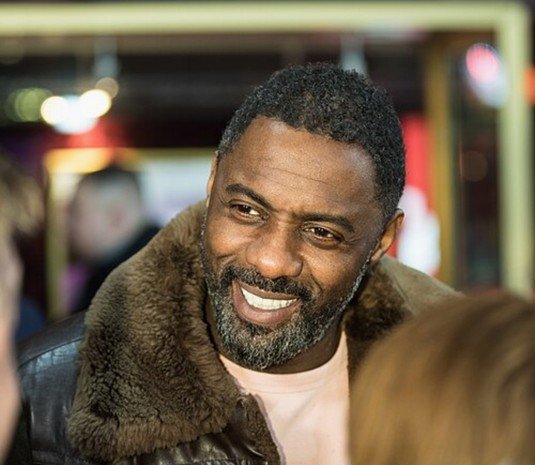 Idris Elba smiling