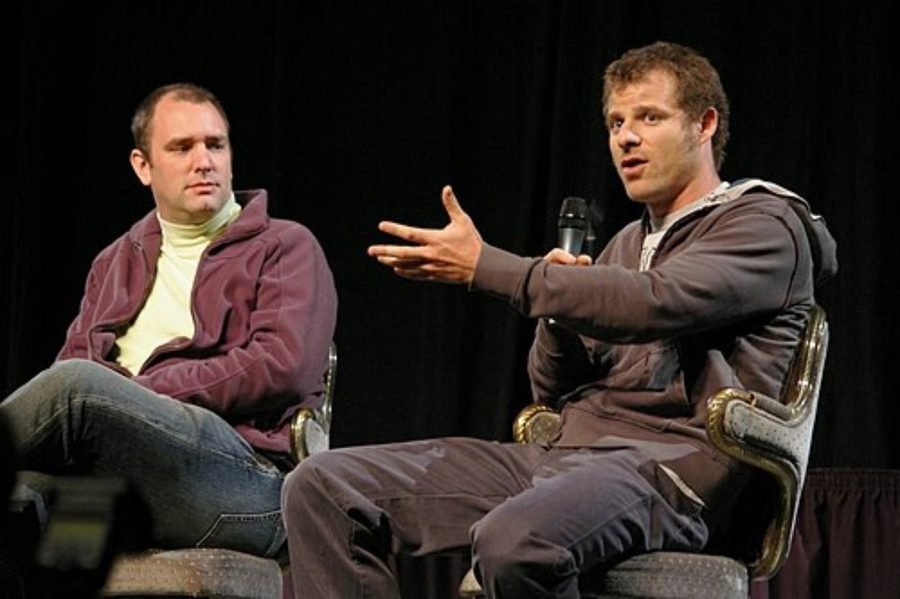 Two men in conversation on a stage, shown in the South Park section