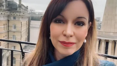 Elizabeth Rizzini presenting the weather on BBC News, showcasing her professional confidence and warm presence.